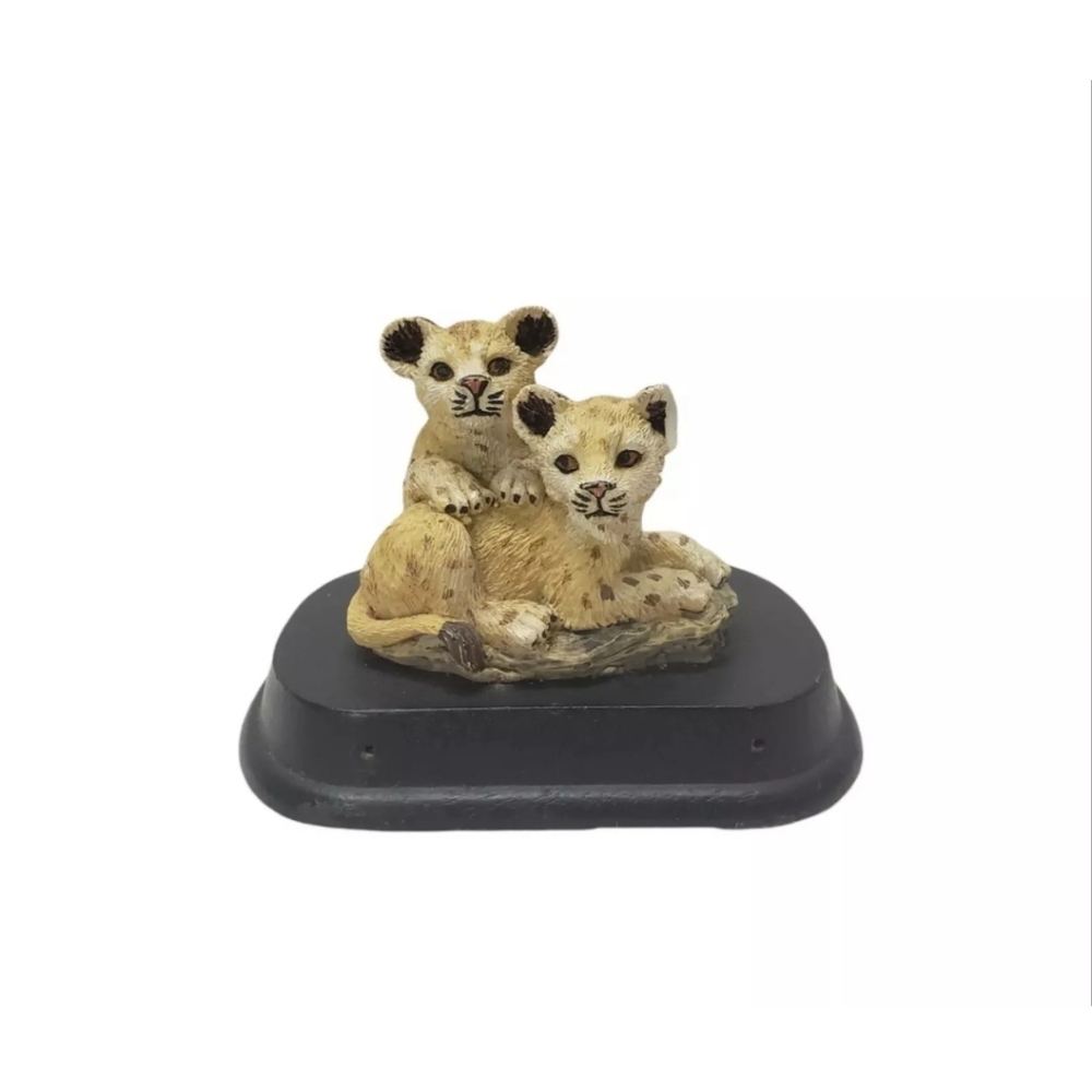 Lion Cub Figurine on Black Base